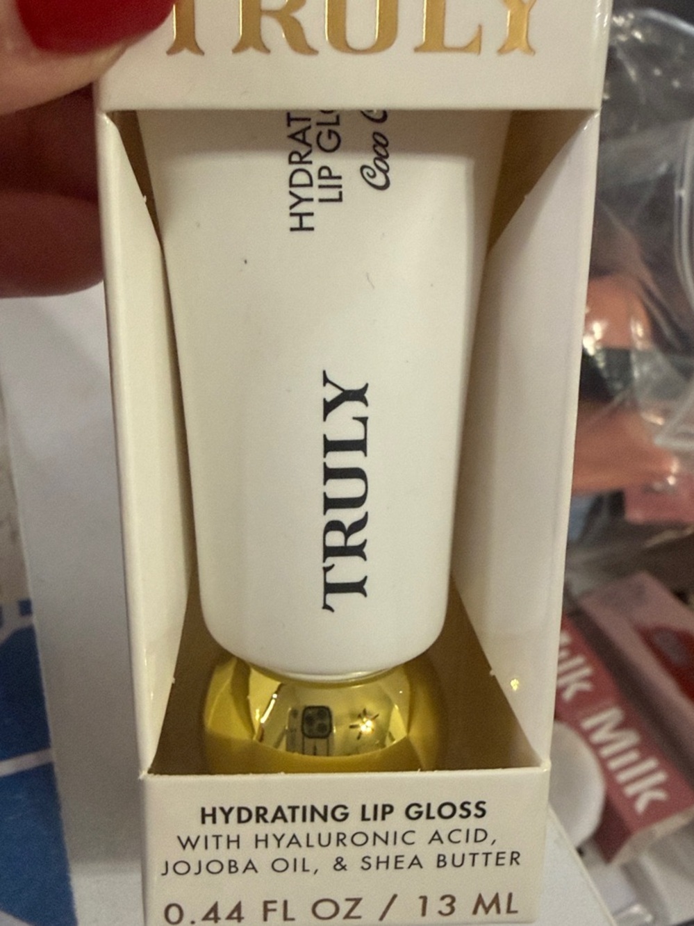 TRULY Hydrating Lip Gloss in White & Gold Packaging